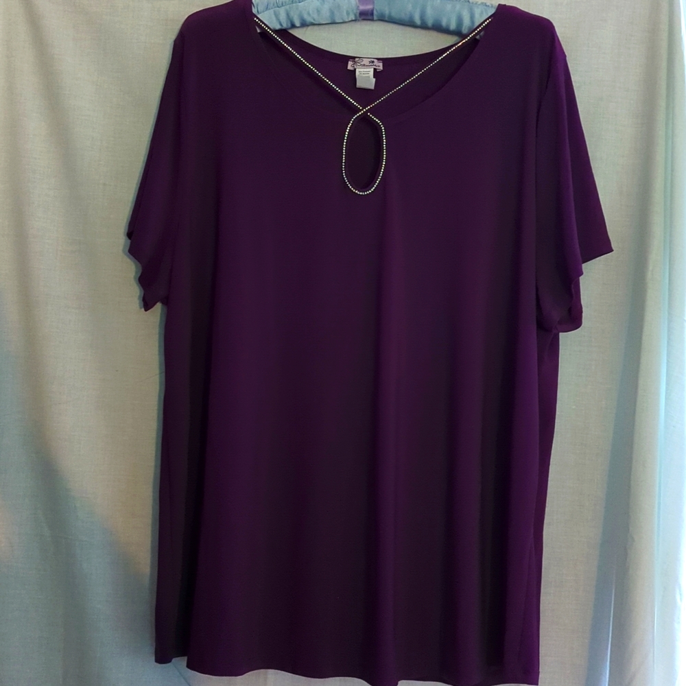 Dressy, flowing knit top with silver gem trim